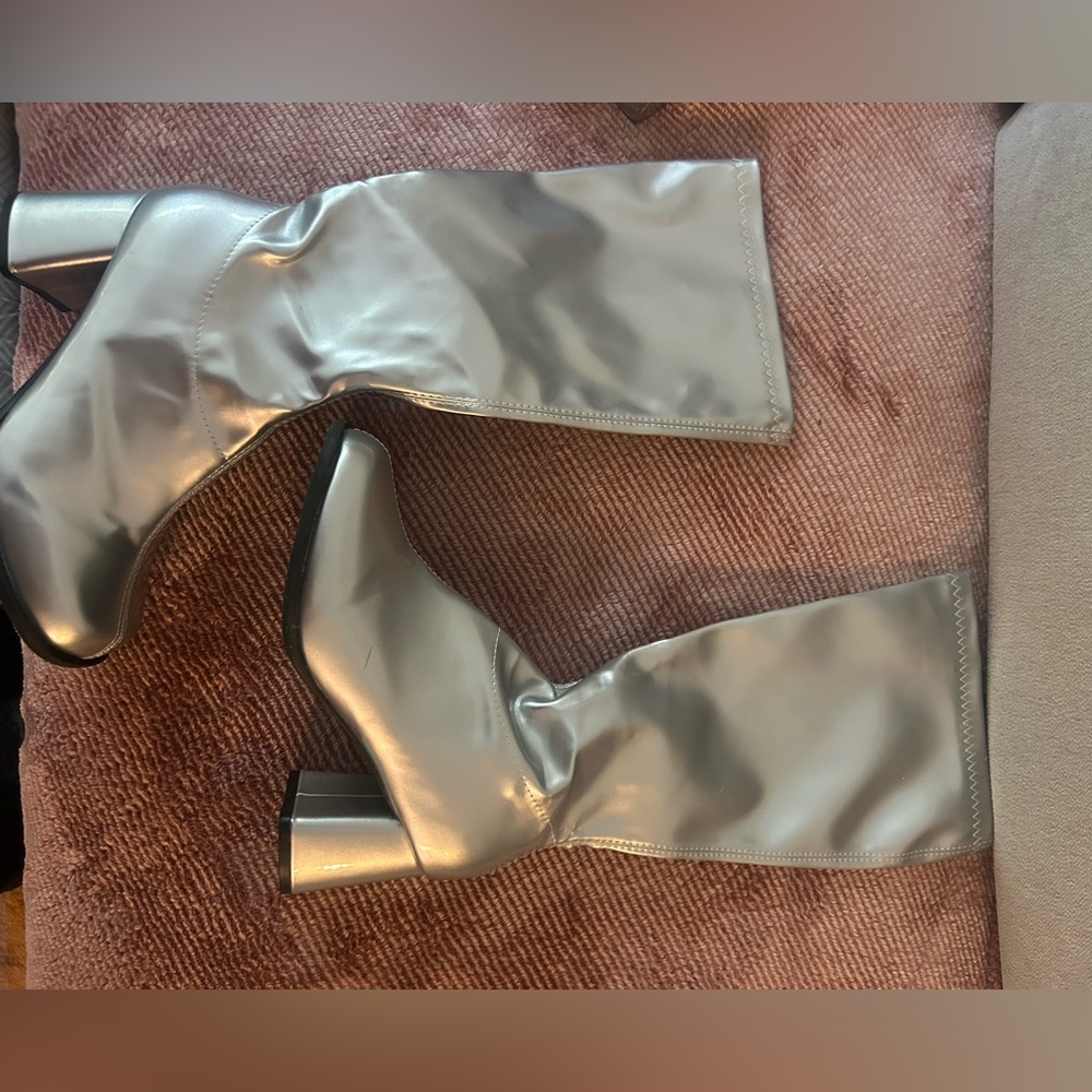 Silver knee high boots